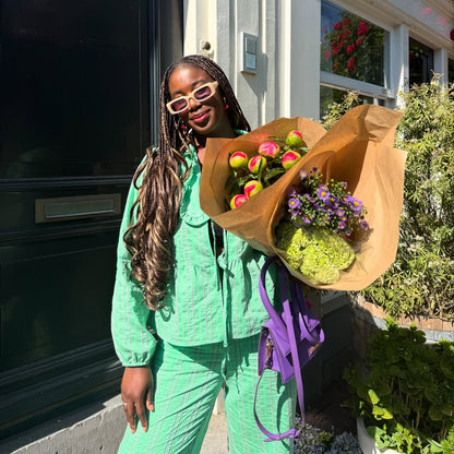 Blouse à rayures vertes avec nœud