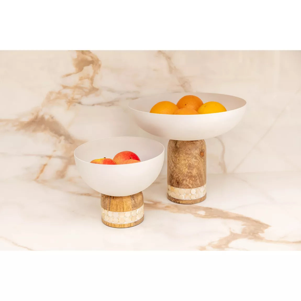 White fruit bowl on a wooden stand