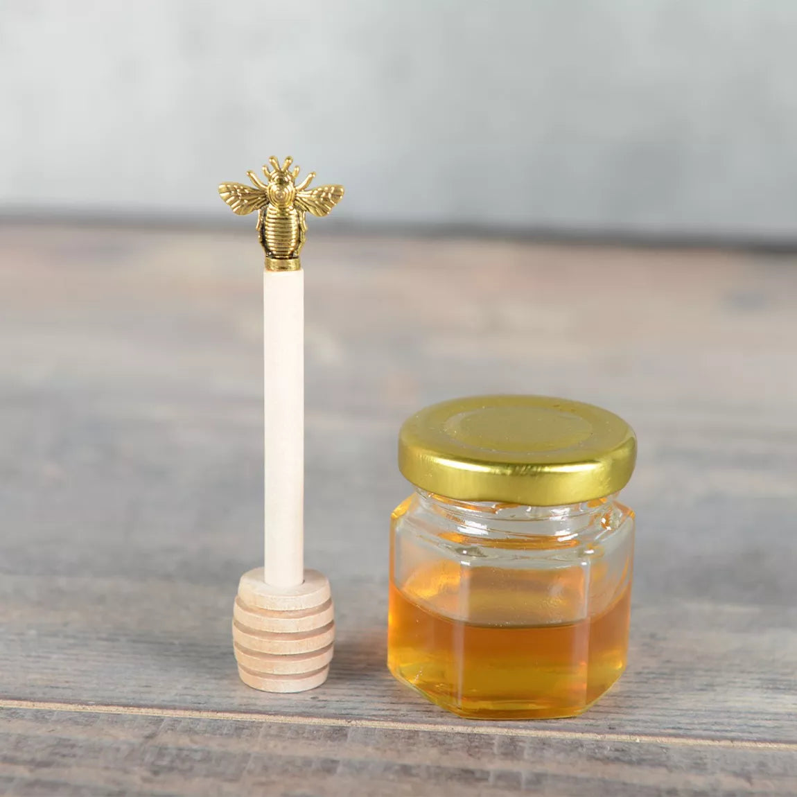 Golden bee honey dipper