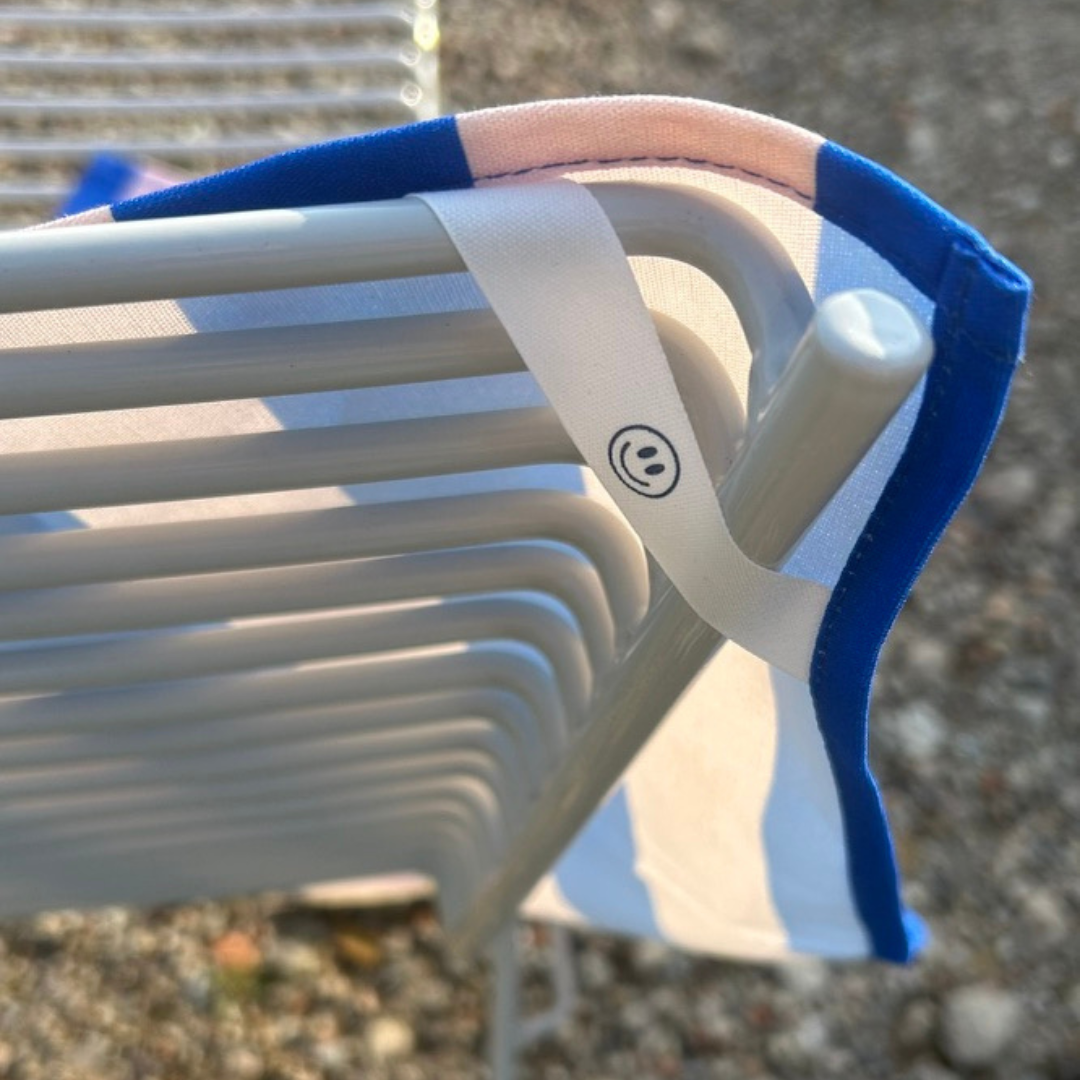 Torchon à rayures bleu-rose