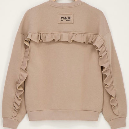 Sweat beige à volants et écusson