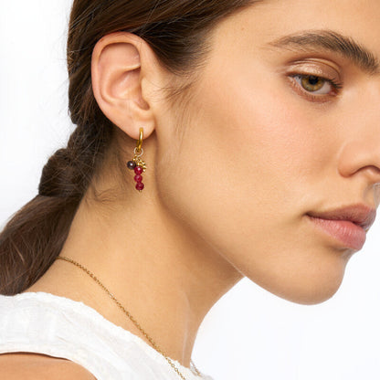 Boucles d'oreilles avec perles bordeaux et soleil