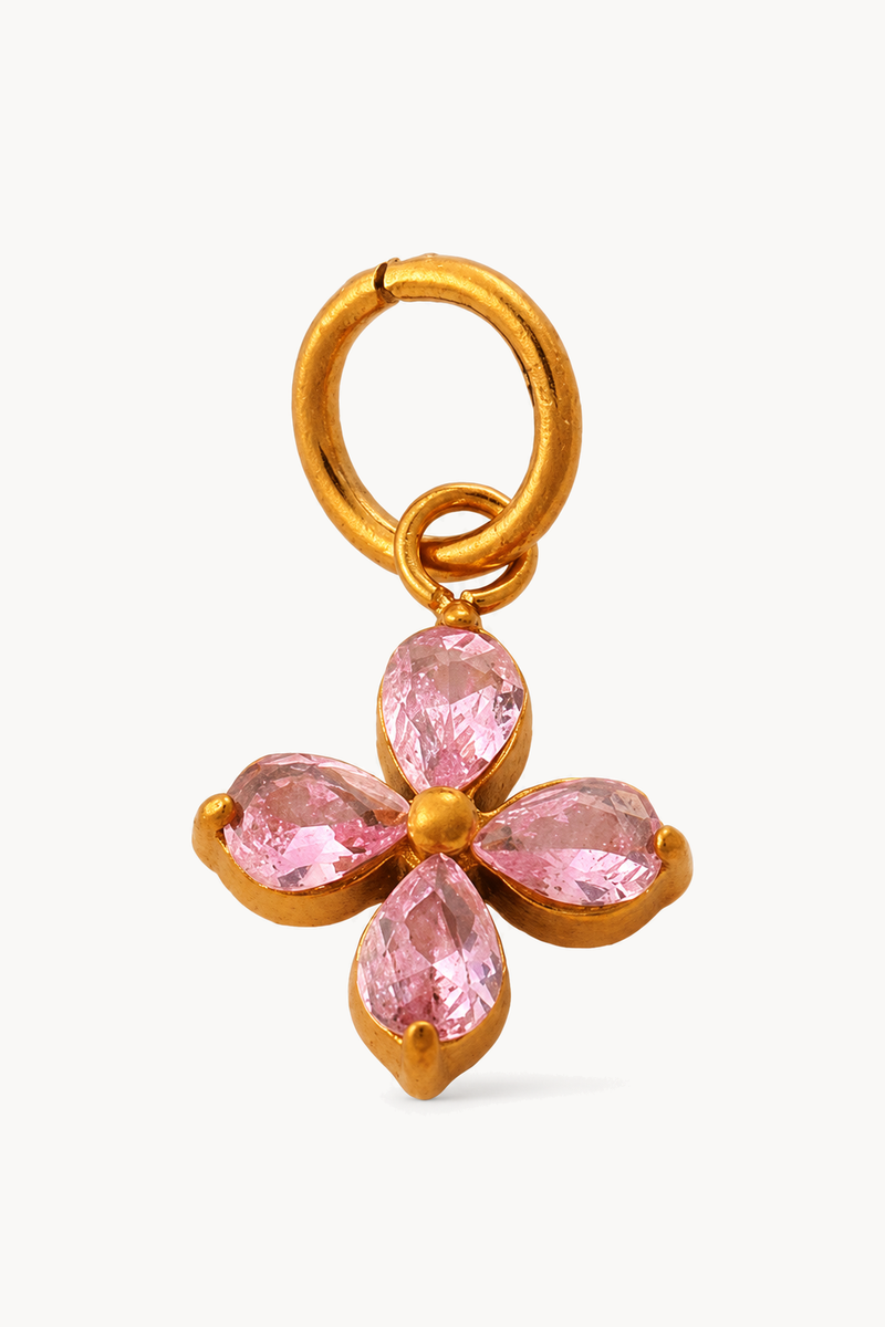 Charm with rhinestones and flower