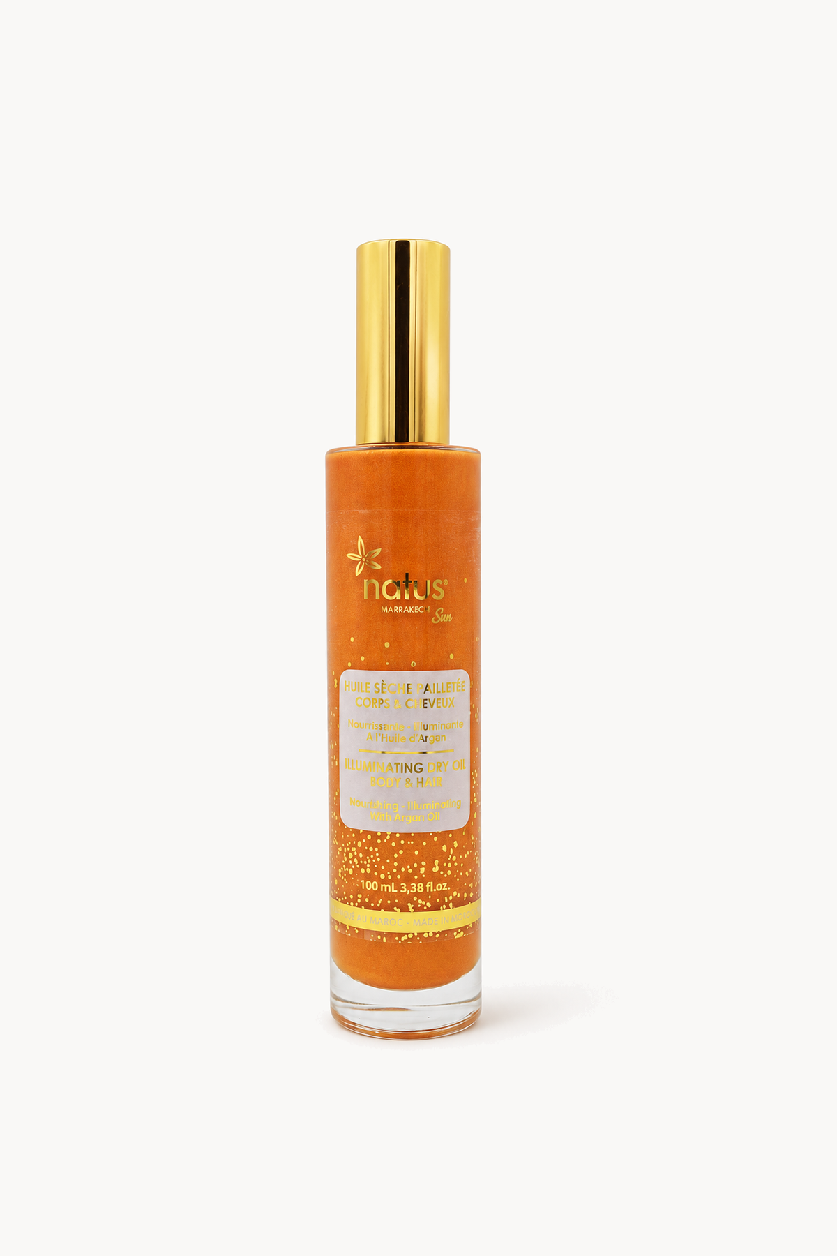 HUILE SÈCHE PAILLETÉE À L'HUILE D'ARGAN - Natus, de face sur fond blanc cassé