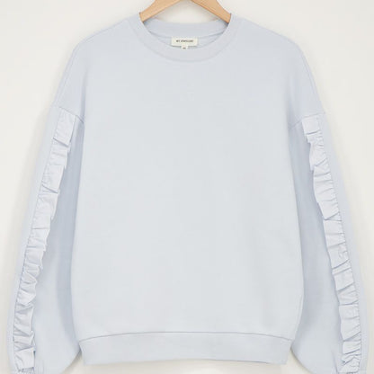 Sweat bleu clair à volants