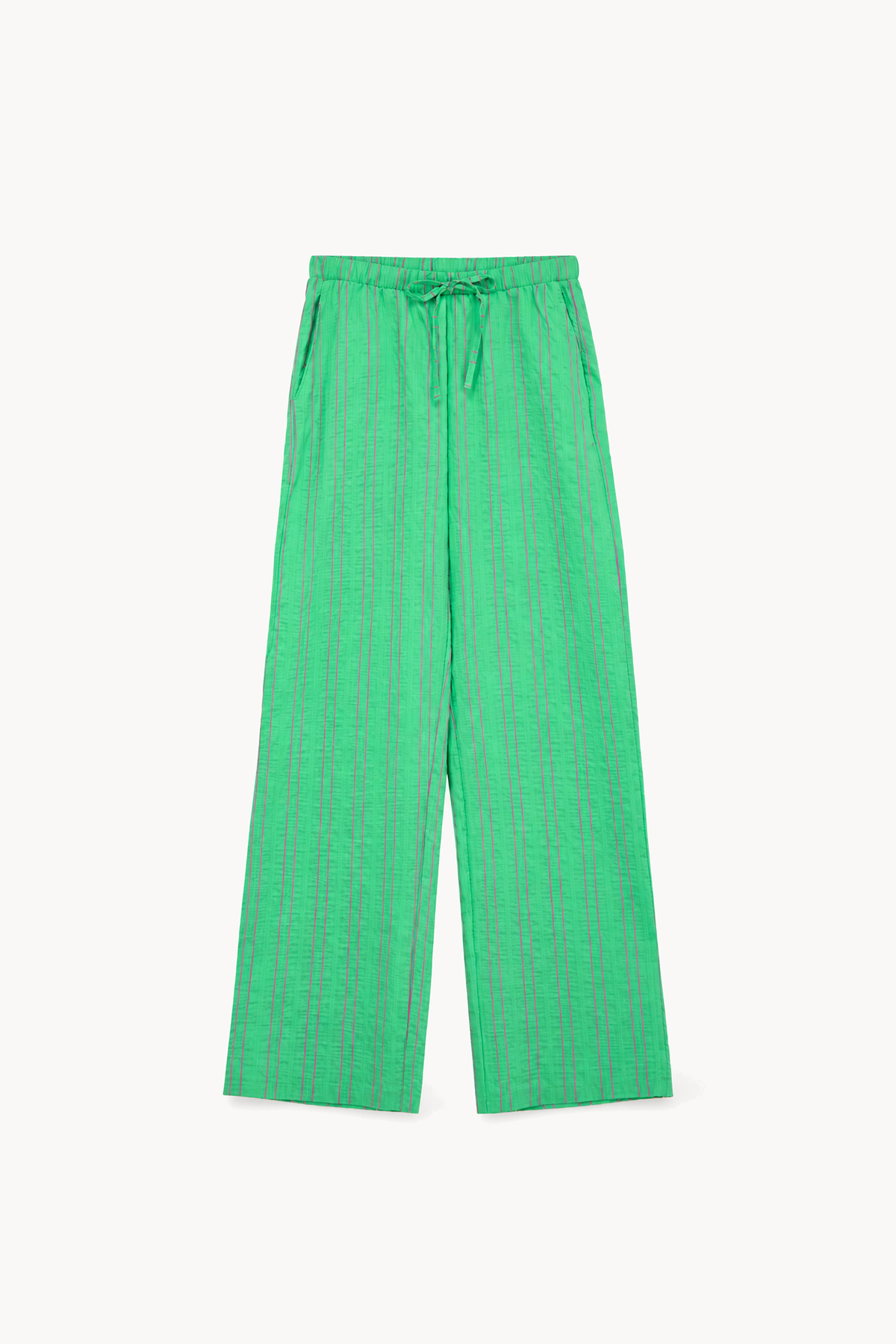 Pantalon large à rayures vertes, de face sur fond blanc cassé