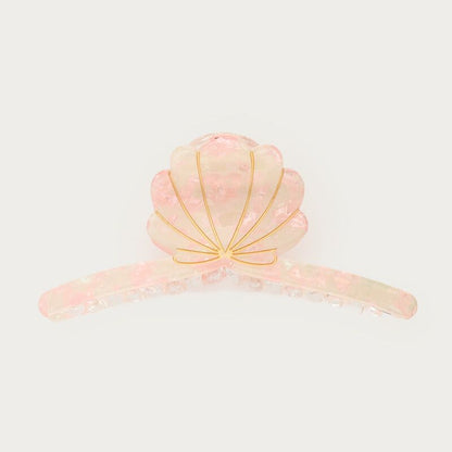 Pince à cheveux beige avec coquillage