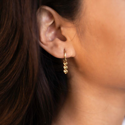 Boucles d’oreilles à trois cœurs