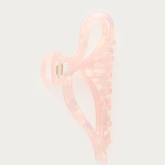 Pince à cheveux rose pâle avec noeud