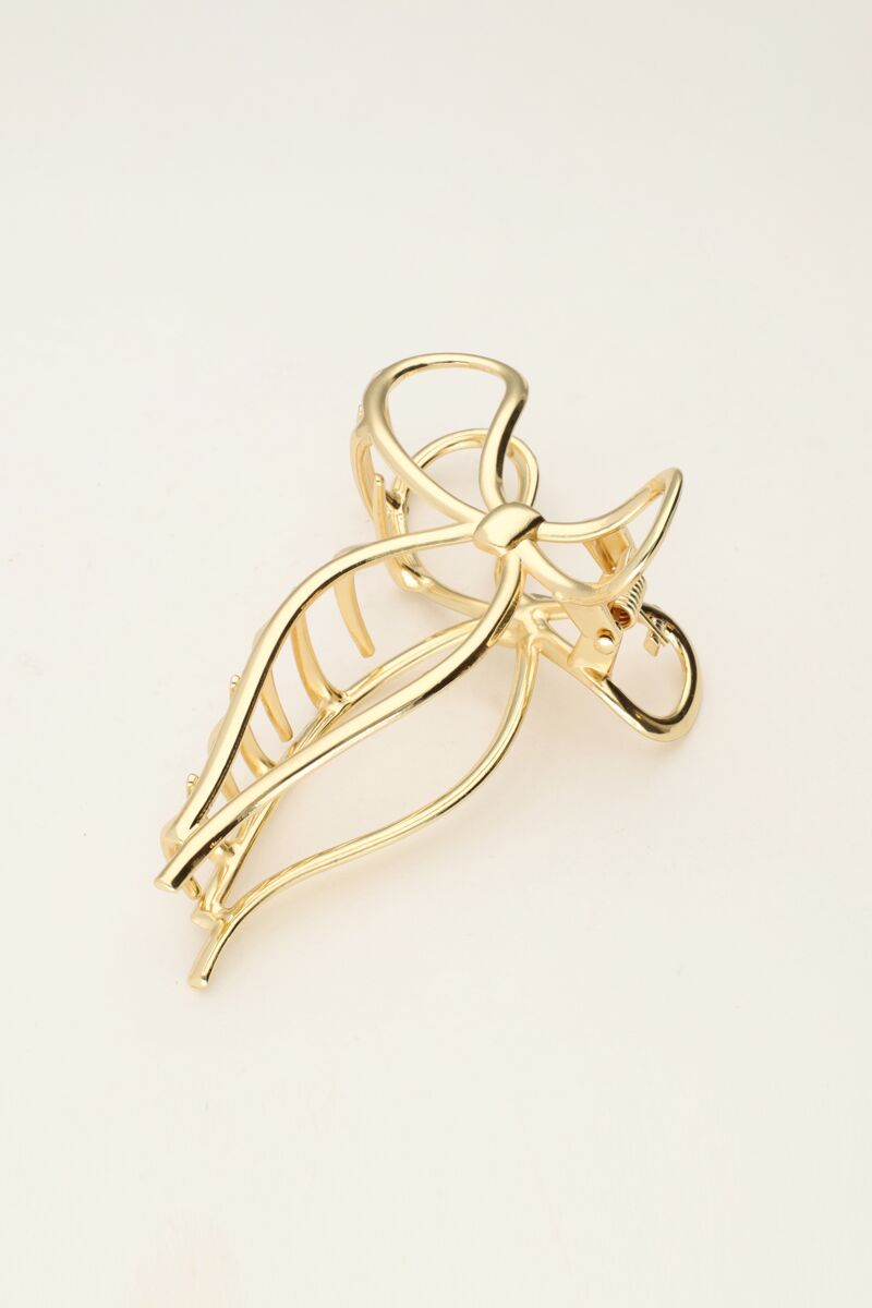 Pince à cheveux avec nœud couleur dorée