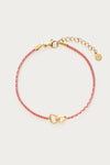 Bracelet en corde rose avec double cœur