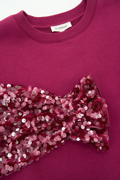 Sweat violet avec manches à paillettes