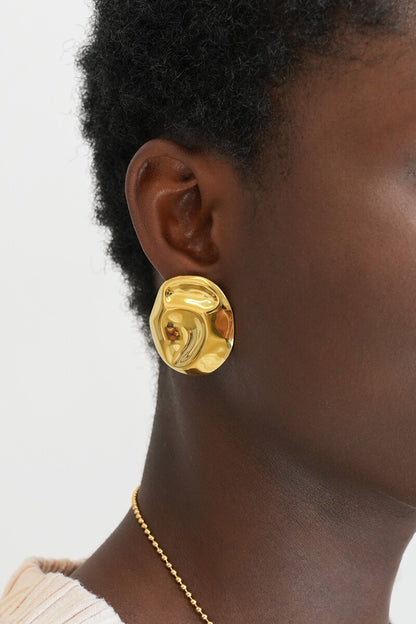 Boucles d'oreilles avec maxi bouton rond