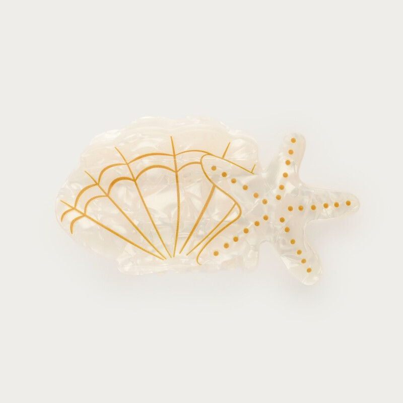 Pince à cheveux blanche avec étoile de mer et coquillage