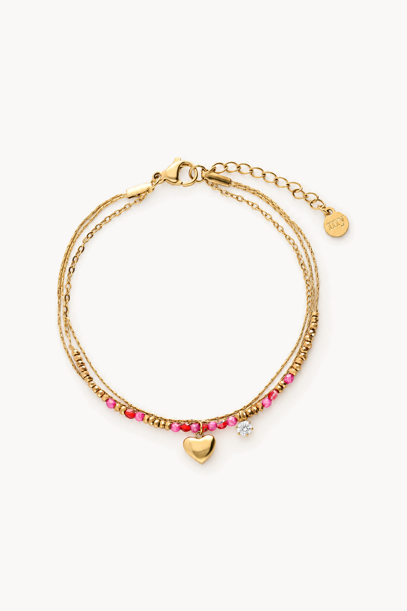 Triple bracelet with pink fancy beads and a heart